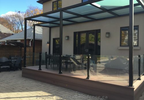 Pvc deck with gazebo and retractable fence